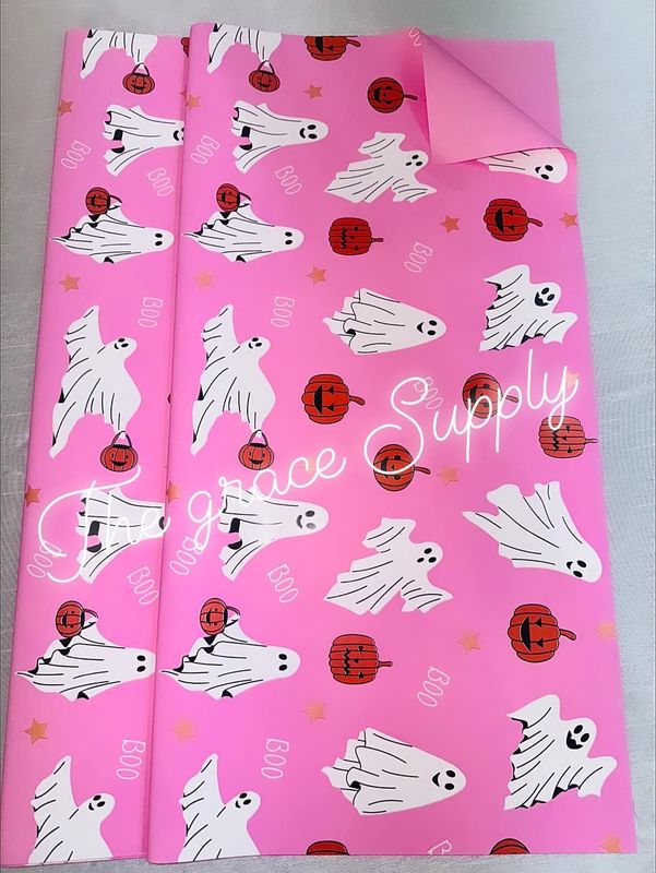 Pink Ghost and pumpkin.
