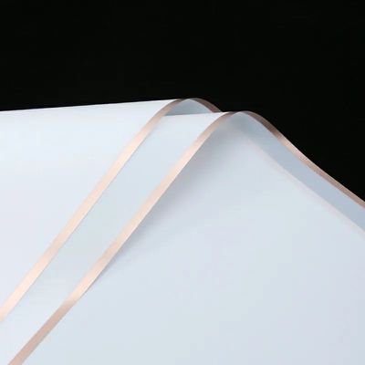 Translucent white with gold edges paper