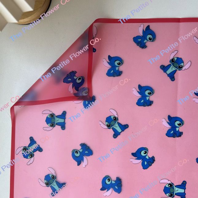 Translucent red stitch paper