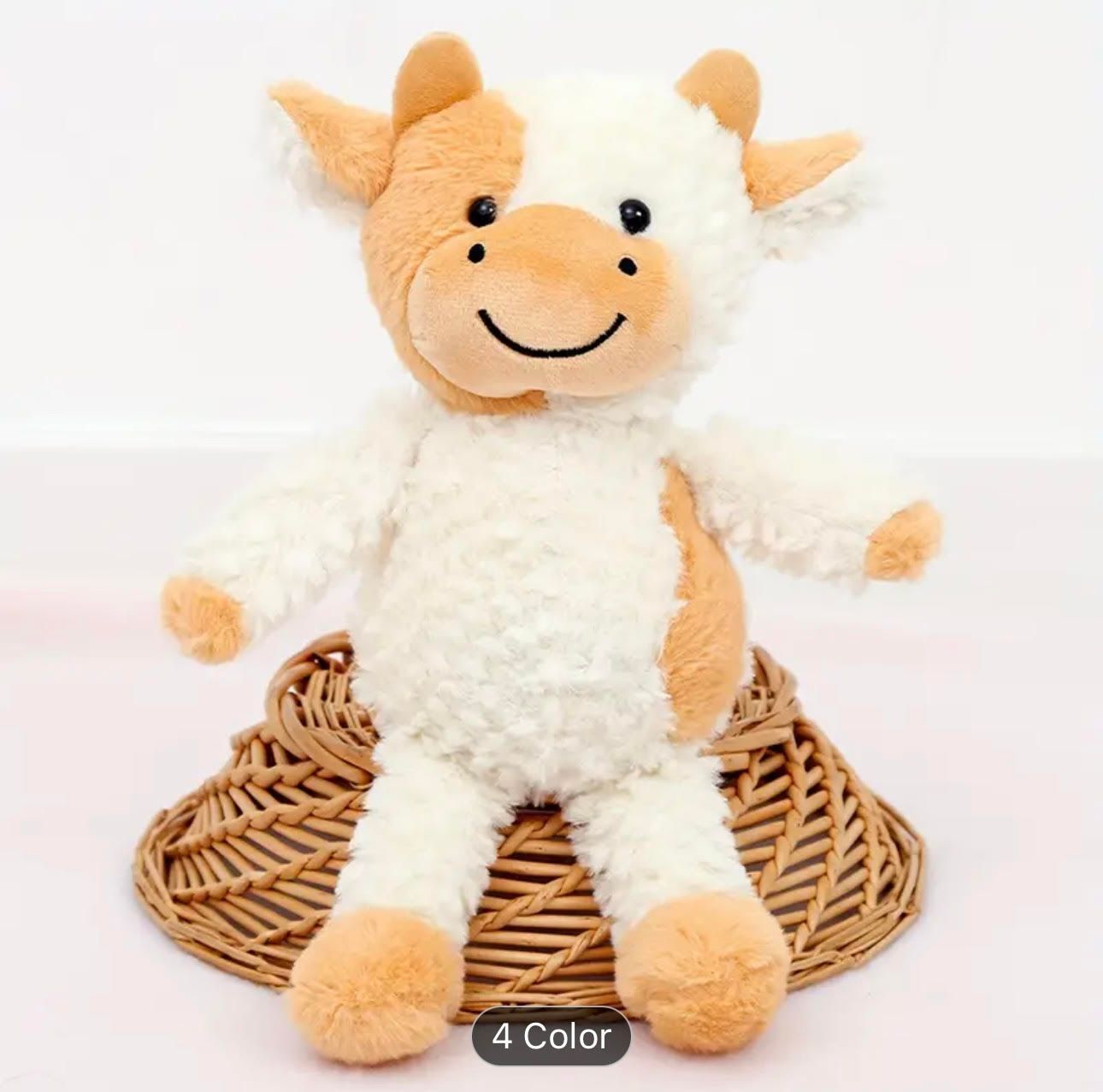 Purple and white cuddly cow plush