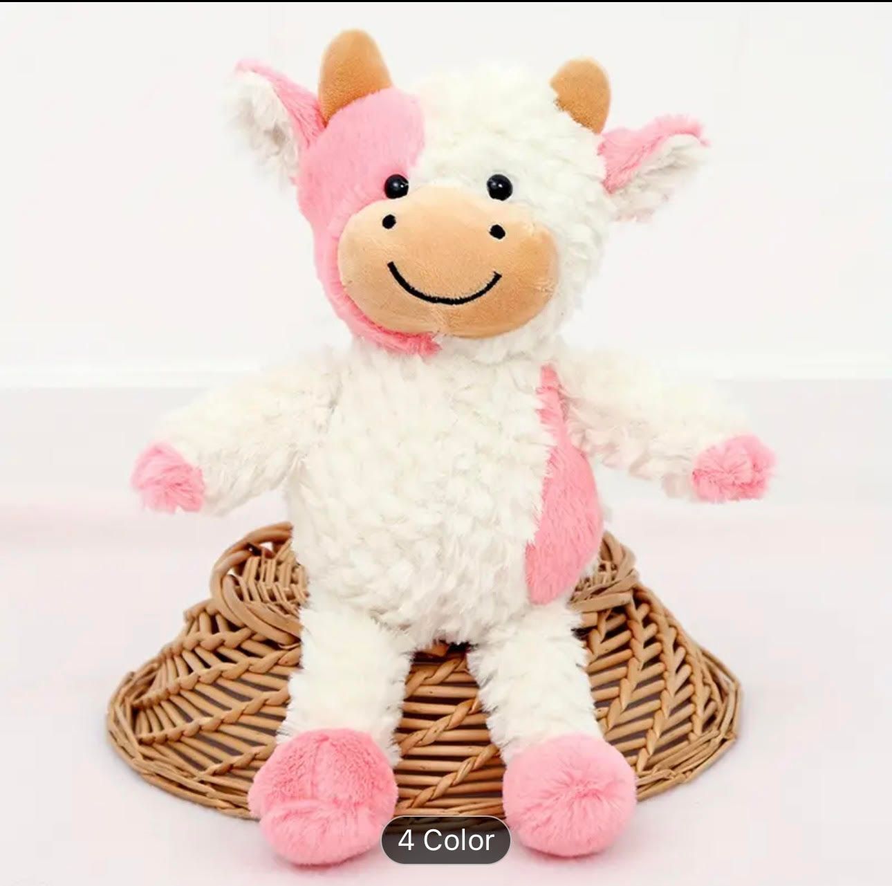 Pink and white cuddly cow plush