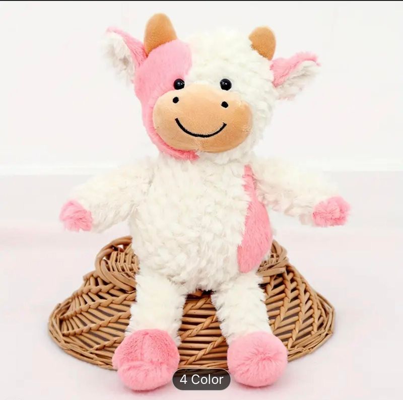 Pink and white cuddly cow plush