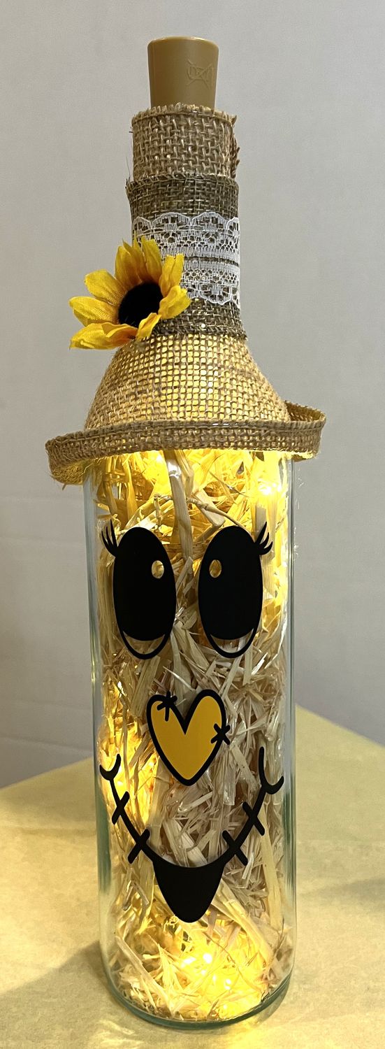 Scarecrow wine bottle light