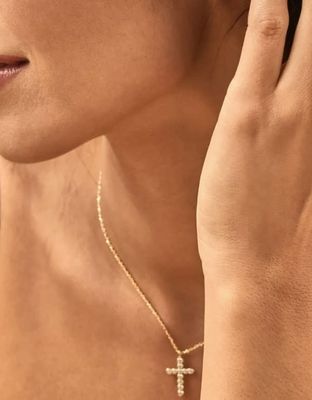 The White Crystal Cross Pendant