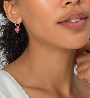 The Ari Heart Gold Huggie Earrings in Rose Quartz
