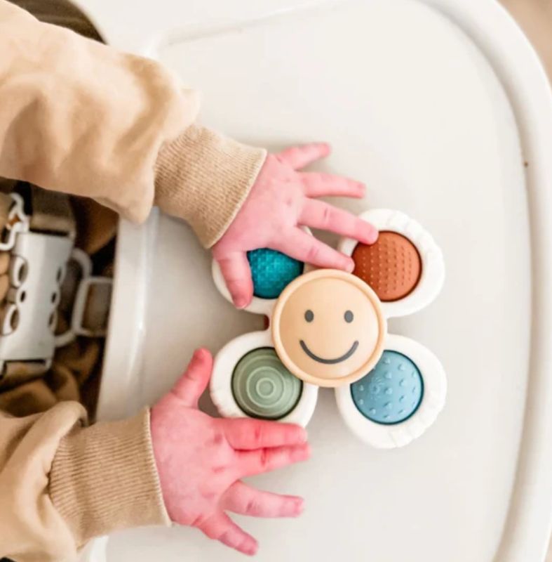 Itzy Pop + Whirl™ Toy | Smile