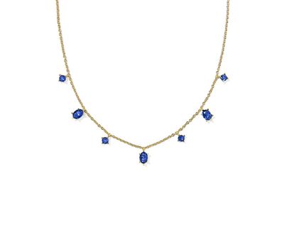 Cailin delicate strand necklace in gold with blue crystal accents, elegant layered jewelry for everyday wear