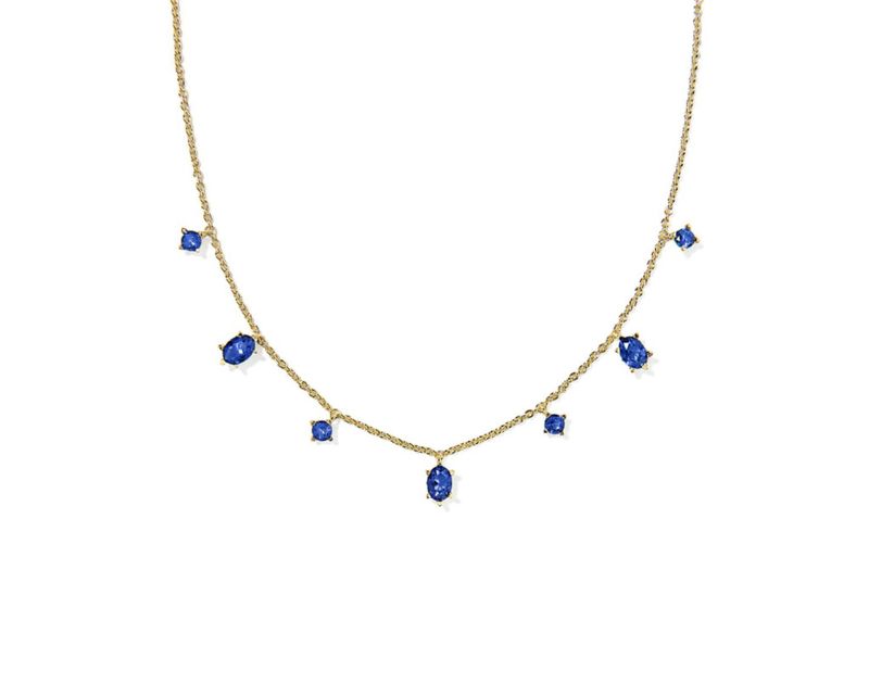 Cailin delicate strand necklace in gold with blue crystal accents, elegant layered jewelry for everyday wear