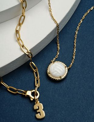 The Volleyball Pendant in White Mother of Pearl