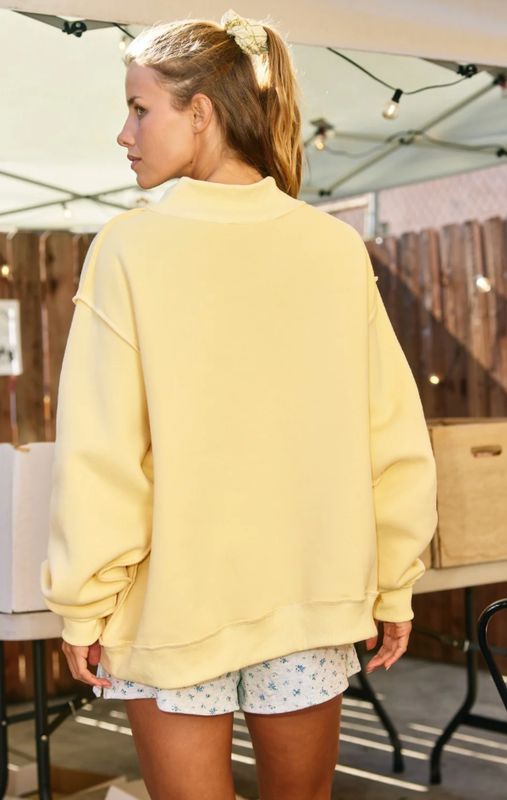 The Dilly Dally Reversible Mock Neck Sweatshirt