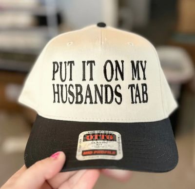 Put It On My Husband's Tab Embroidered Hat | Natural/Black