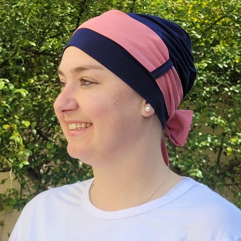 Carey Navy chemo hat with Pink ribbon