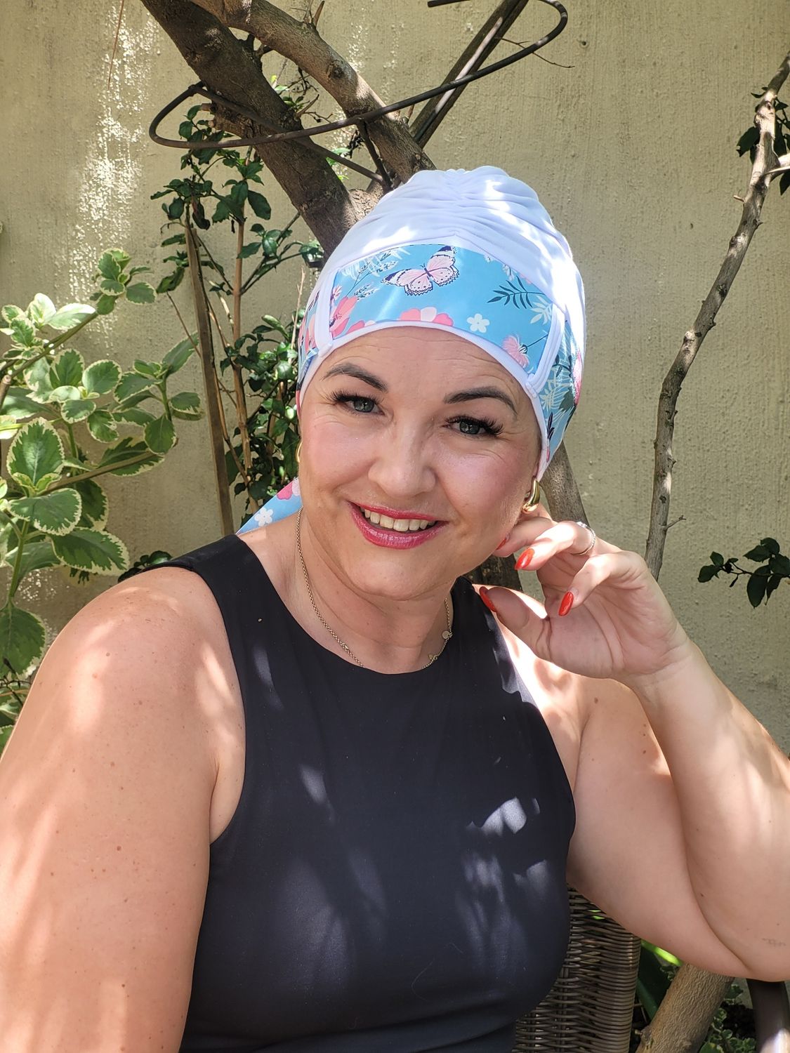Carey  Chemo White hat with butterflies and flower Ribbon