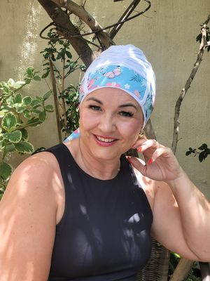 Carey  Chemo White hat with butterflies and flower Ribbon