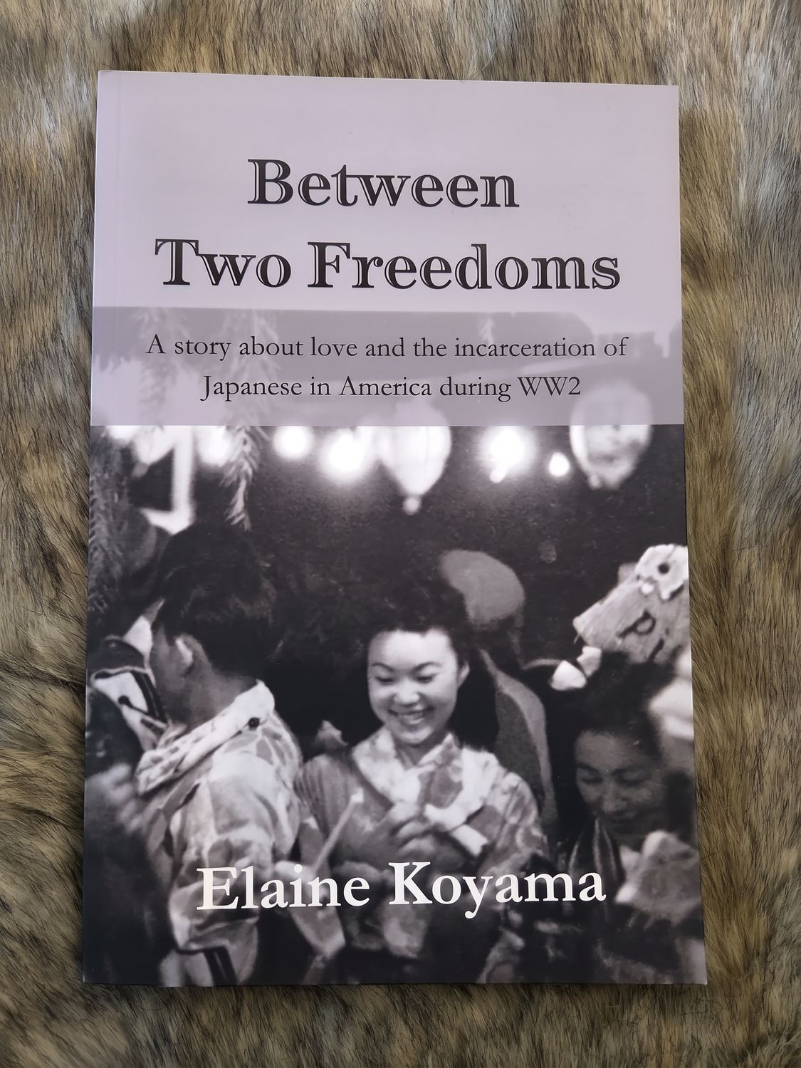 BETWEEN TWO FREEDOMS; E. Koyama