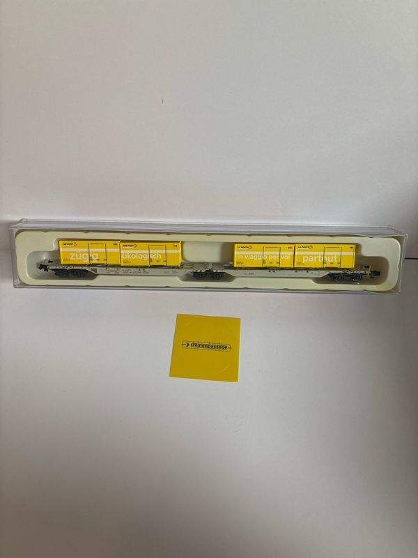 Hobbytrain H23713 - Containerdraagwagon SGGNOS 715, V AAE met 4x20' Post CH N