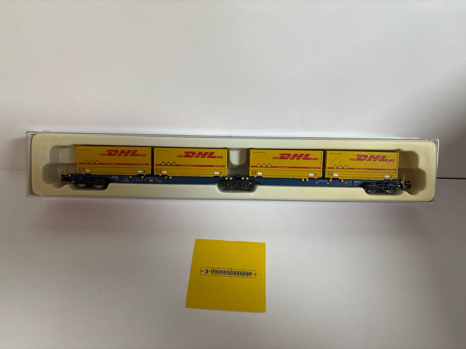 Hobbytrain H23729 - Containerdraagwagon Sggmrs 715, DB AG  met 4x20' DHL N