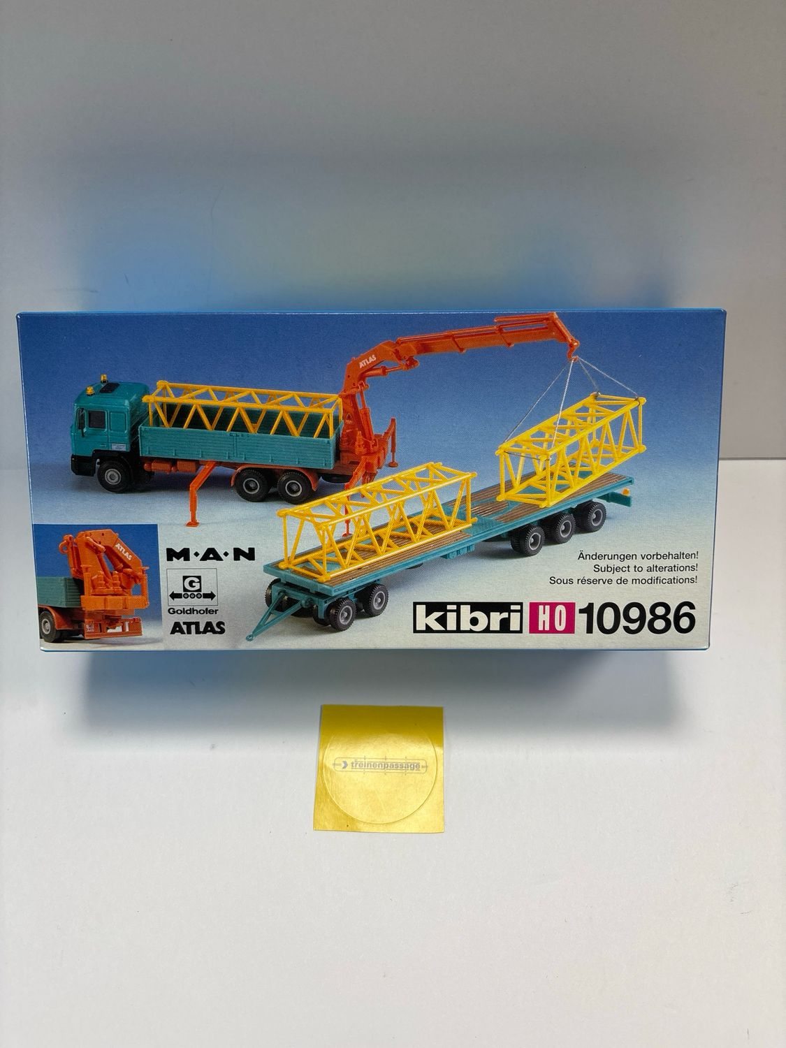 Kibri 10986 - MAN met Atlas laadkraan en 5-assige aanhanger H0