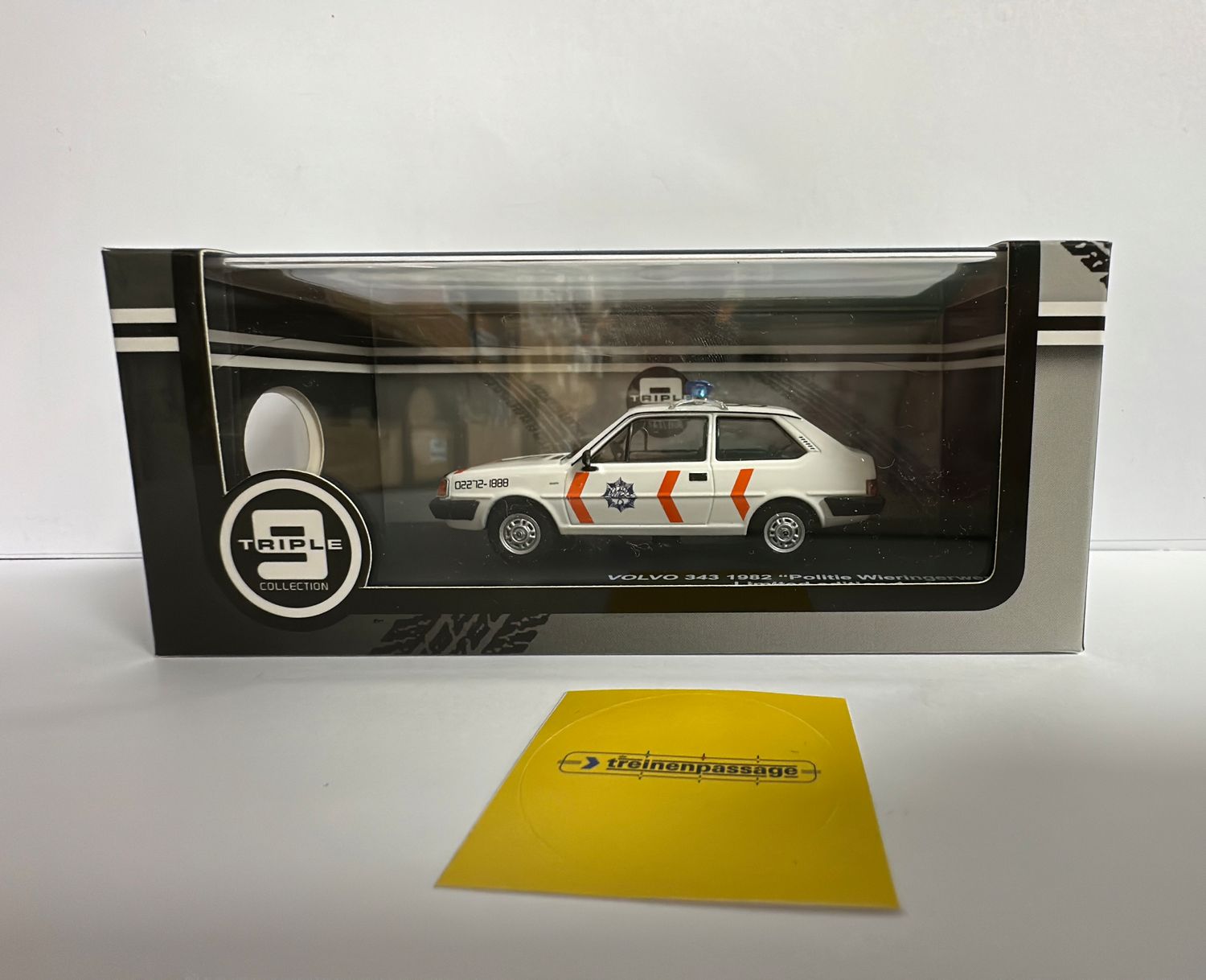 Triple 9 1:43 - Volvo 343, 1982, "Politie Wieringerwerf", white/orange with original long bumpers.