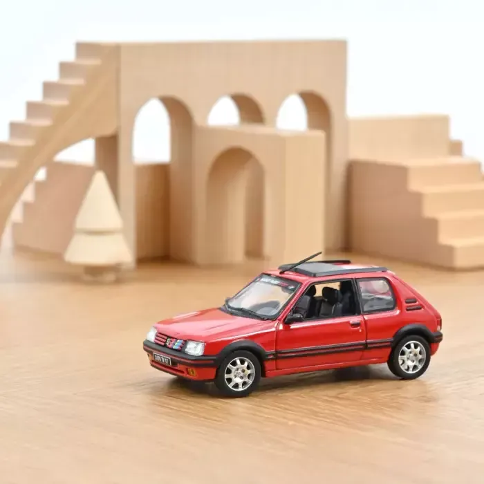 Norev 1:43 - Peugeot 205 GTI 1.9 1991 Vallelunga Red with PTS deco