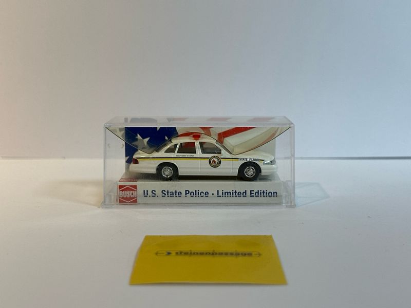 Busch 1:87 - Ford Crown Victoria "State Police North Dakota" nr. 33