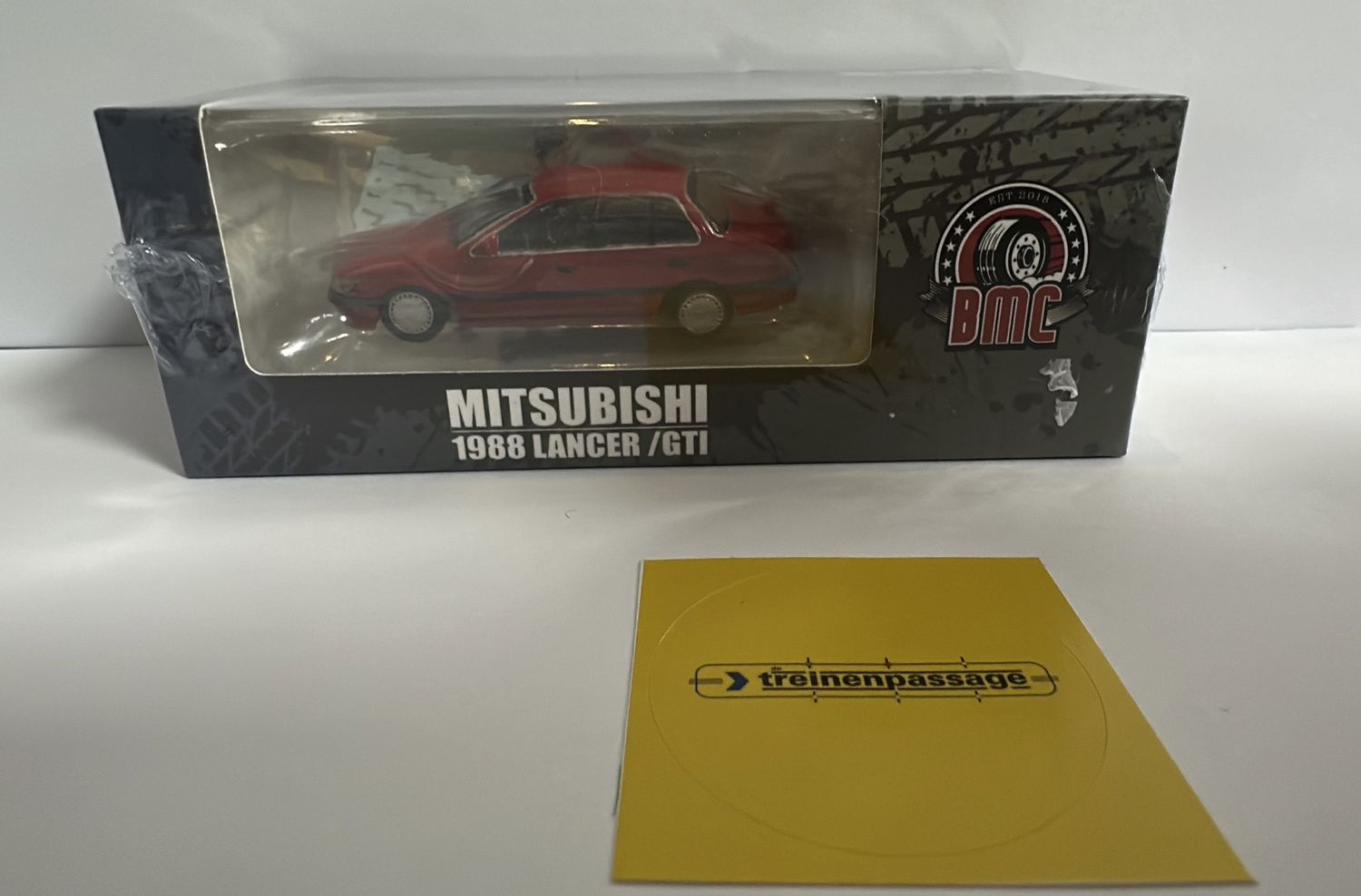 BM Creations 1:64 -Mitsubishi Lancer 1988 RED (LHD)