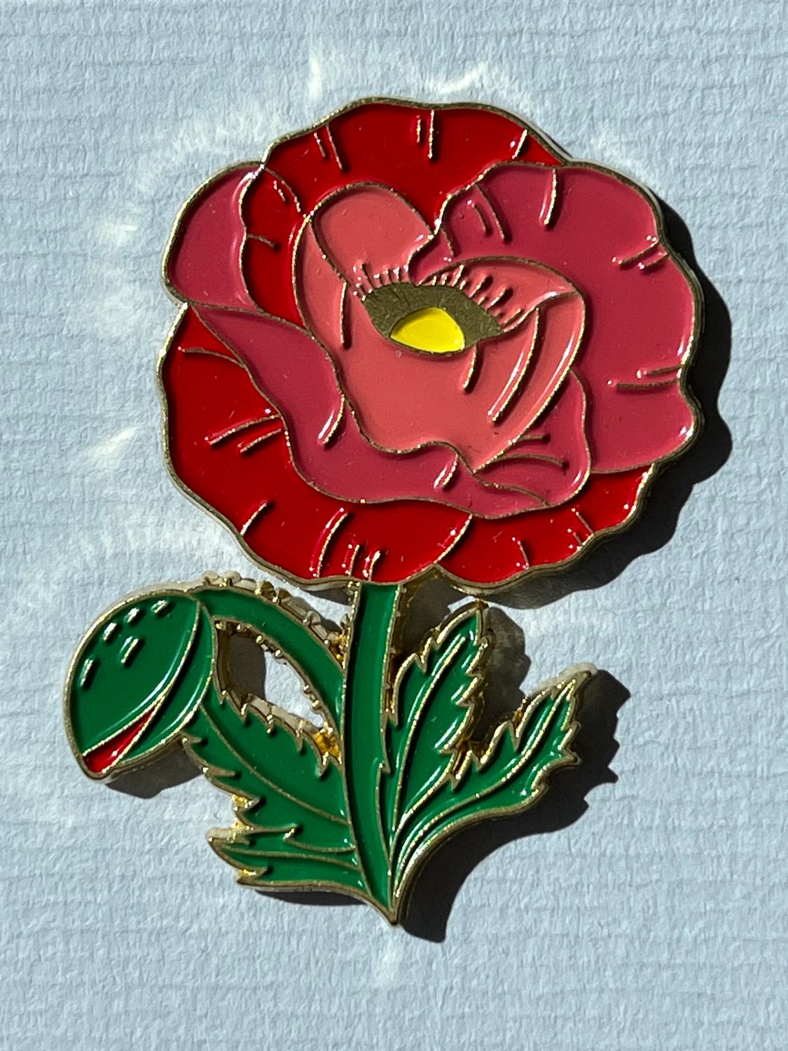 Pin bloem rood/roze