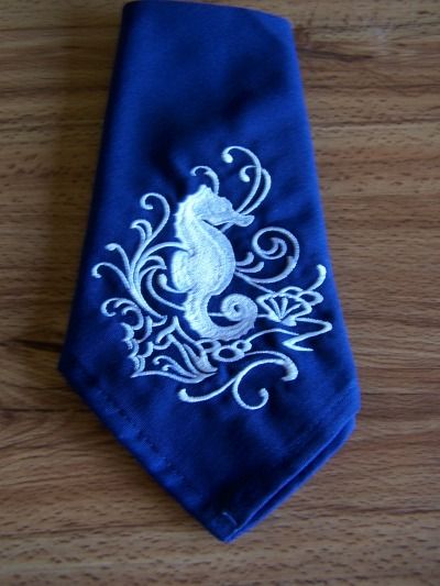 Two embroidered 18x18 inch Dark Blue Linen napkins with a filled Seahorse design # 102 *****