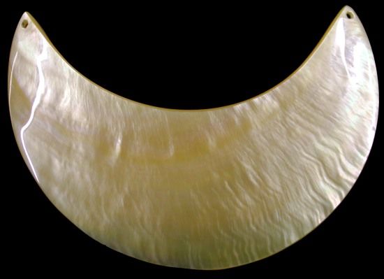 One cut Gold Cut Mother of Pearl measuring 3.5 to 4 inches with drilled  hole at each tip. OUT OF STOCK ****