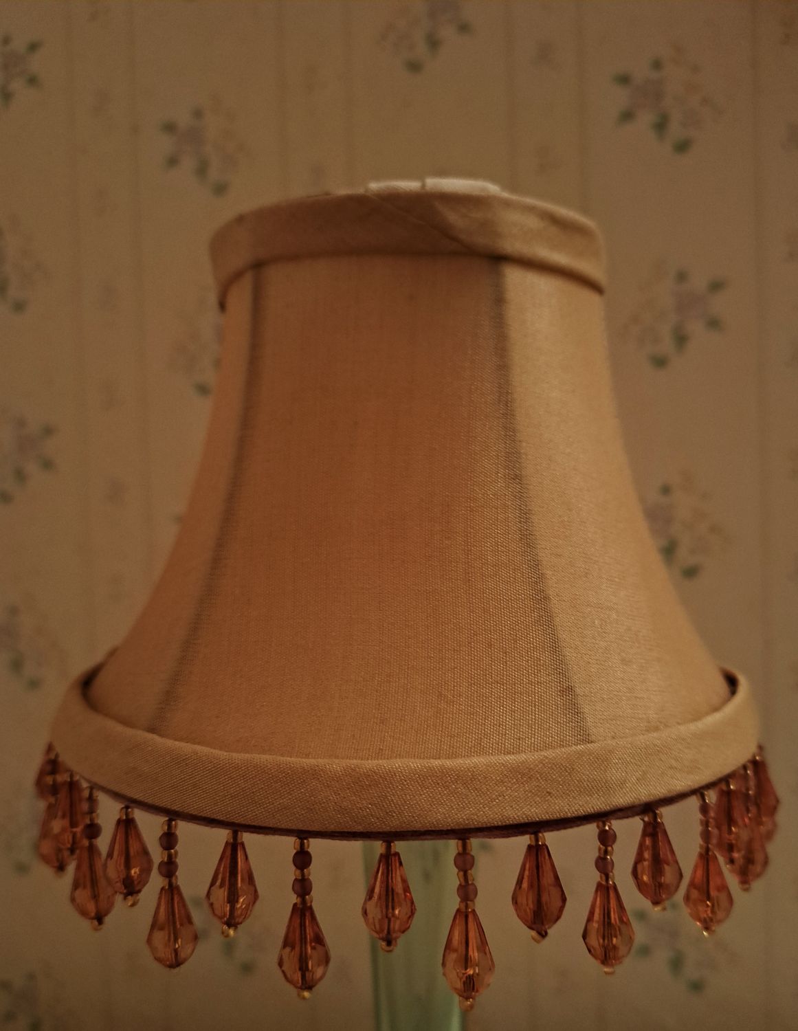 A 3x6x4&quot; Clip on tan fabric lampshade. 1&quot; beaded &amp; matching color trim