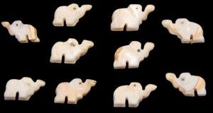 Elephants Hand Carved from Luhanus Shells with Drilled Hole measuring 1/2 to 3/4"  Sold  Each