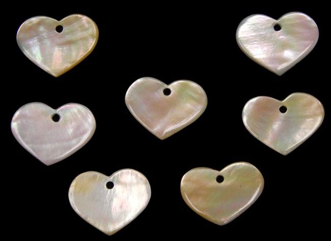 Hand Carved Gold Mother of Pearl Hearts with a Drilled Hole measuring 1"   Sold Each