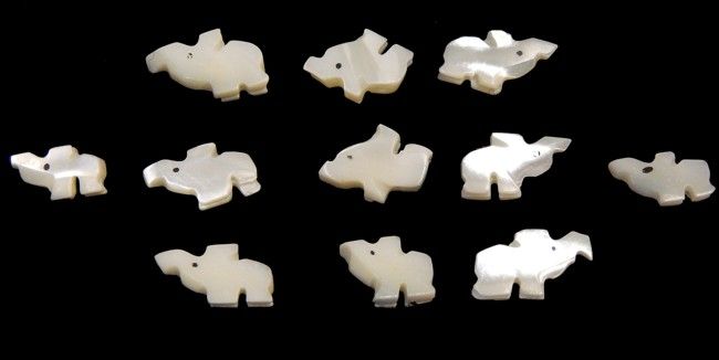 Troca Shells Hand Carved into Elephants with a Drilled Hole measuring 1/2 to 3/4" Sold Each