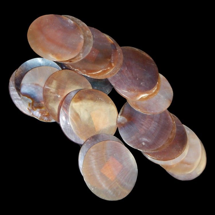 Cut BrownLip Oyster Shells measuring 1 to 1 1/2"  Sold Each