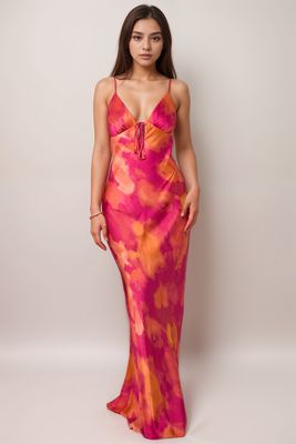 Robe longue dos nu fuchsia pour femme avec imprimé aquarelle orange et rose – tenue estivale bohème chic vue de face
