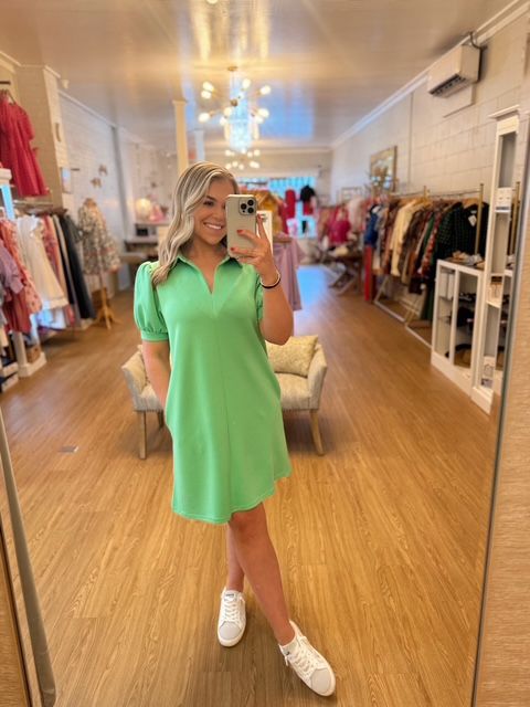 Open collared neck, side pockets, puffed short sleeves dress