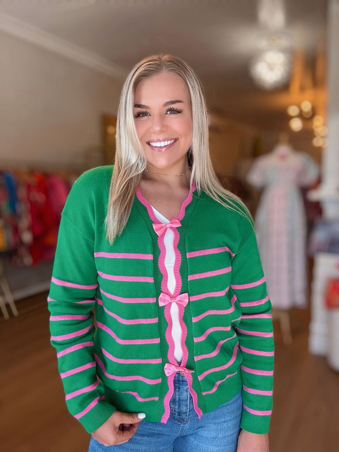 Green Sweater With Pink Stripes And Bow Details