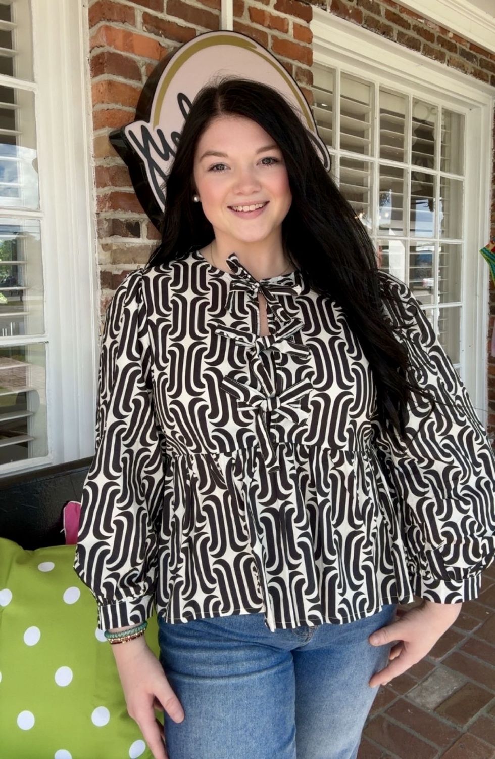 It Seems Right Black Geometric Top With Bows On Front