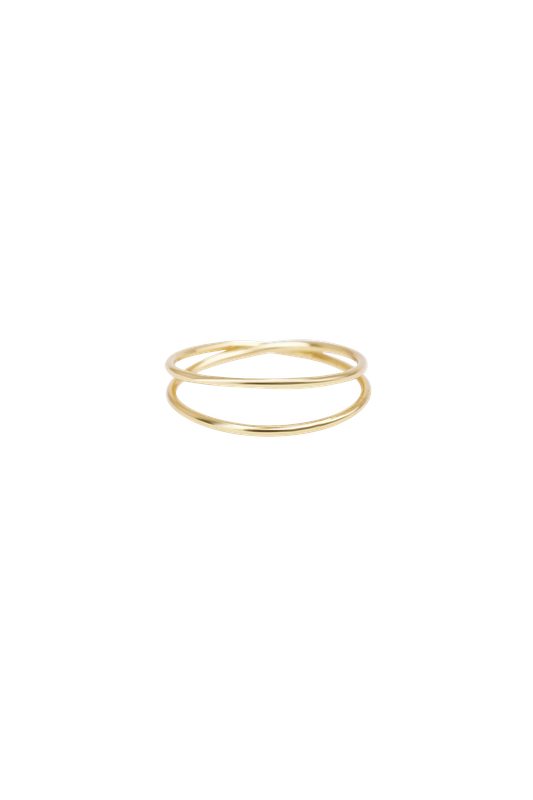 Xzota handmade brass ring with a subtle twisted design, wearable as a regular ring or as a pinky ring.