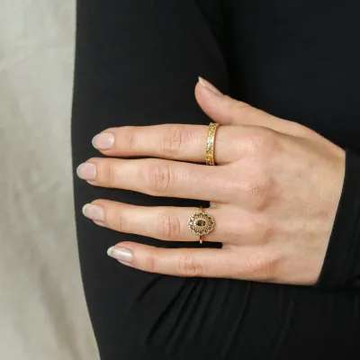 Jopsephina - Kae Smoky Flower Ring worn on hand, displaying its elegant fit and timeless vintage design with smoky quartz.