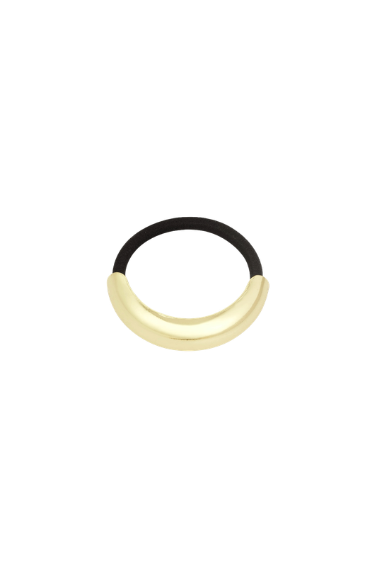 Bold Hair Elastic from Maison Maeva, a hair tie with a metal accent in gold, also available in silver.
