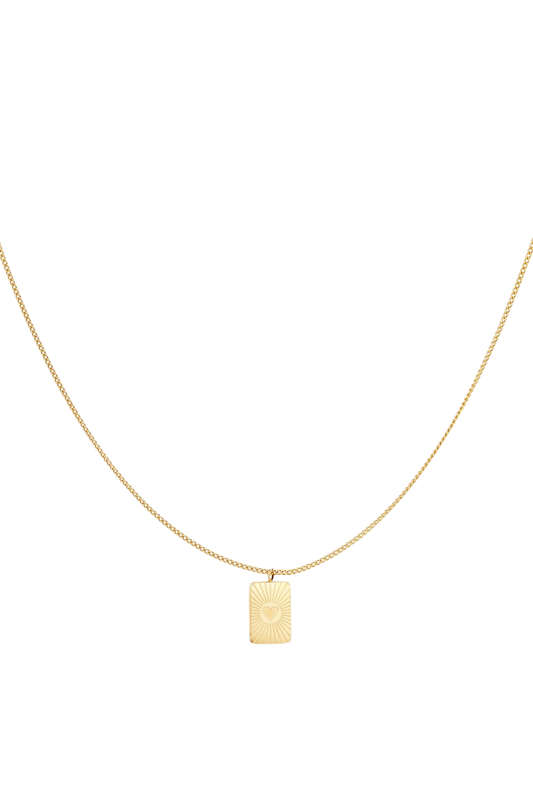 Gold-plated necklace with a small rectangular pendant engraved with a heart, perfect for a stylish and timeless look.