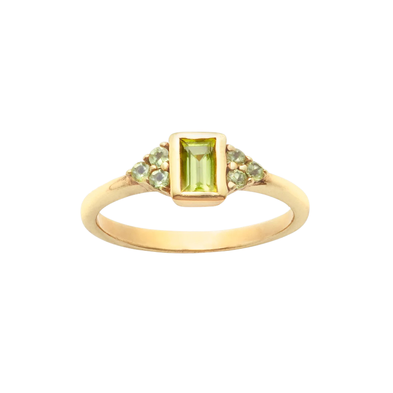 Close-up of the Vintage Peridot Flower Ring, featuring the square peridot gemstone and three smaller peridots on each side in a timeless flower design.