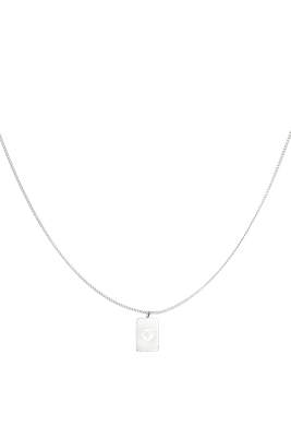 Gold-plated necklace with a small rectangular pendant engraved with a heart, perfect for a stylish and timeless look.