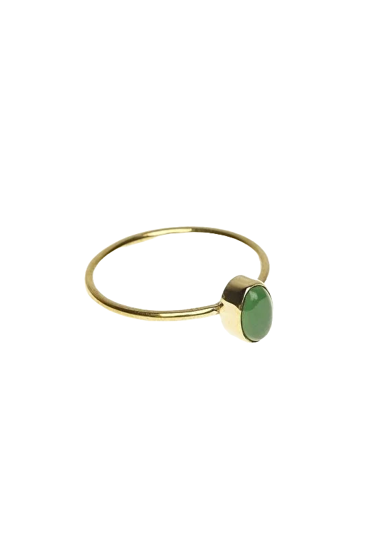 Brass Green Jade Ring, handmade in Bali with a oval deep green jade gemstone, offered by Maison Maeva.

