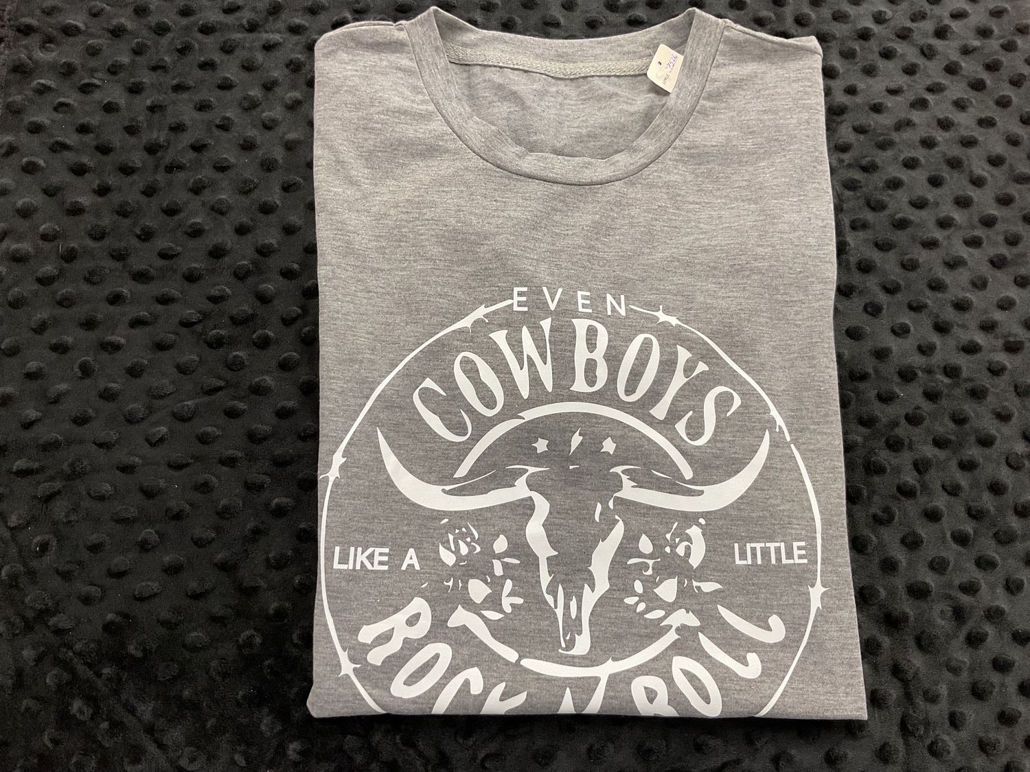 EVEN COWBOYS ROCK AND ROLL
