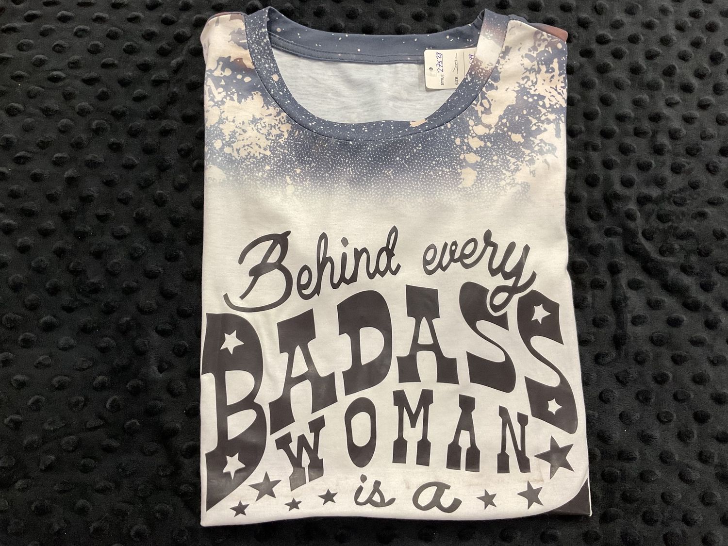 BEHIND WOMAN IS A CARSEAT TEE