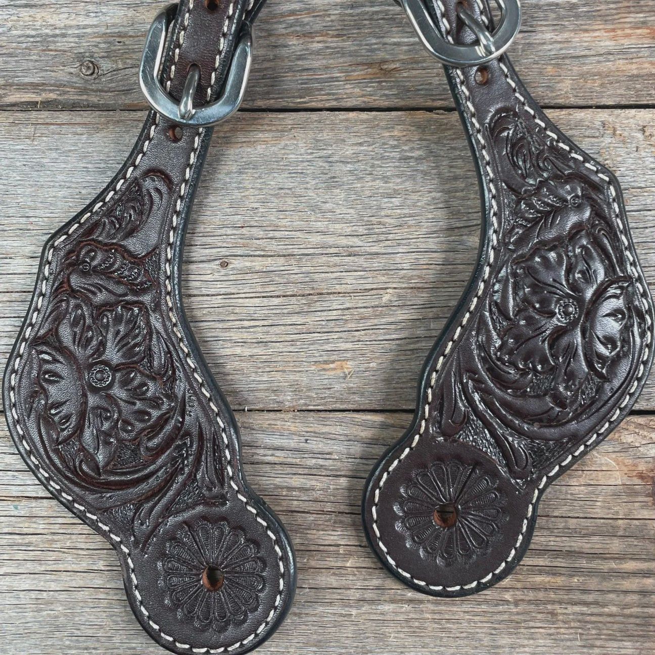 Dark oil floral tooled spur straps