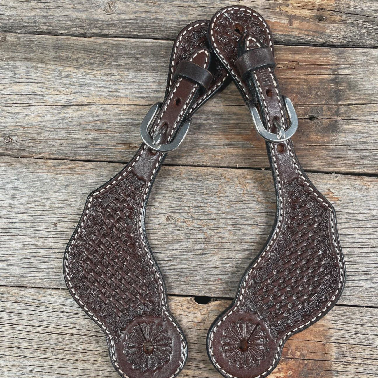 Dark oil basketweave tooled spur straps