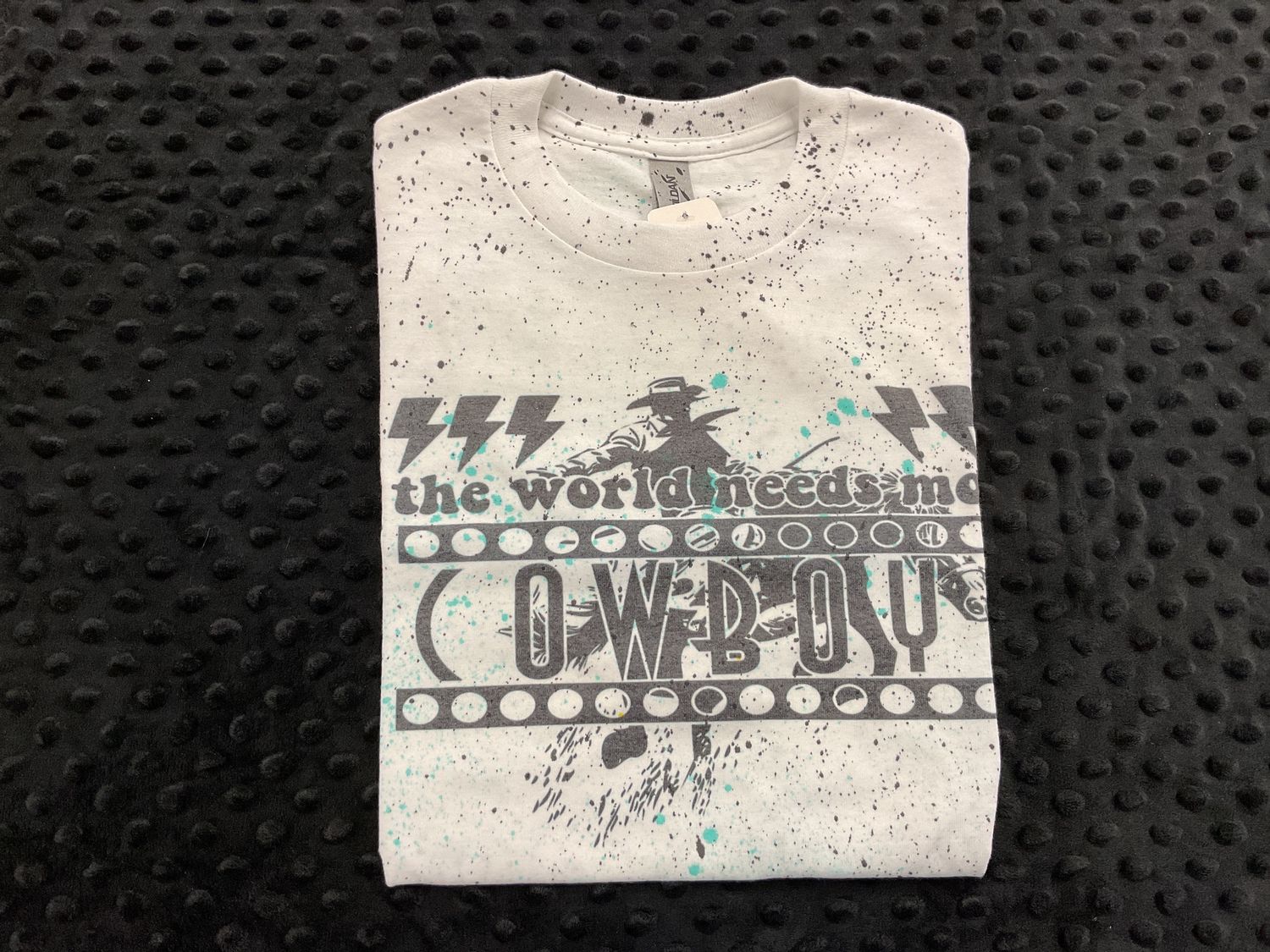 WORLD NEEDS MORE COWBOYS TEE